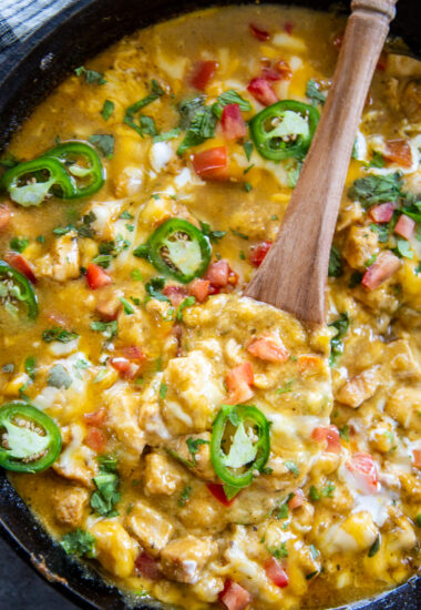 overhead shot chicken chile verde topped with jalapenos and cilantro