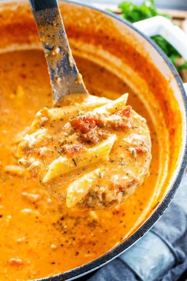 ladle of italian sausage pasta soup