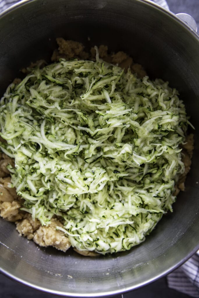 zucchini shredded in mixing bowl