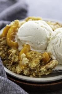 close up shot peach dump cake