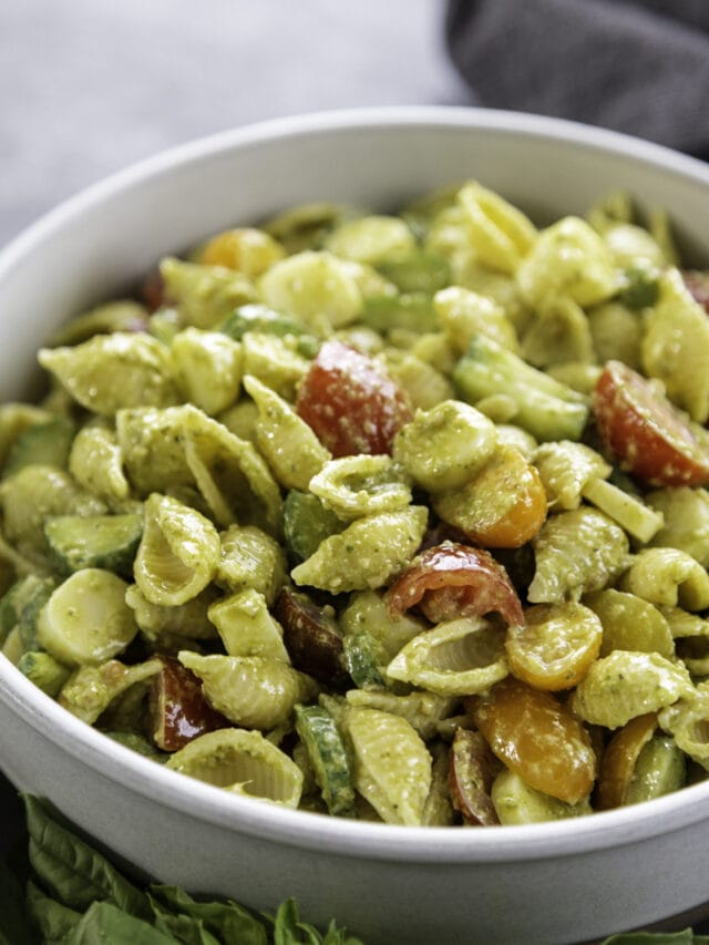 bowl of pesto pasta salad with veggies