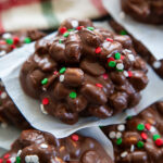 chocolate peanut clusters stack with Christmas sprinkles