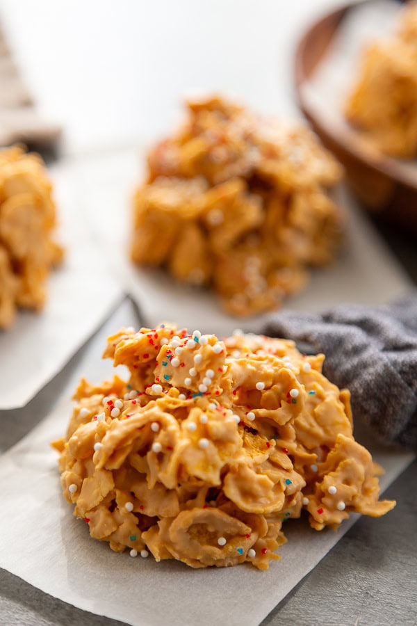 butterscotch cornflake cookies on on top of parchment paper