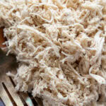 shredded chicken on plate overhead shot
