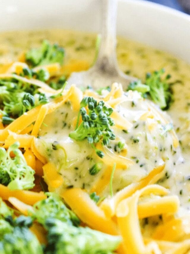 bowl of broccoli and cheese soup with spoon