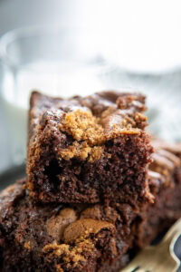 chocolate coffee cake pieces stacked on plate