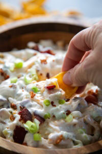dip a chip into bacon cheddar ranch dip