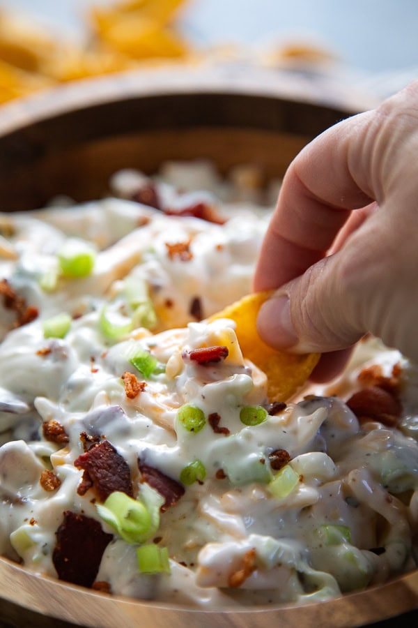dip a chip into bacon cheddar ranch dip
