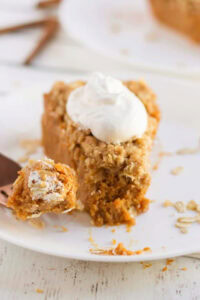 pumpkin pie slice on plate with fork