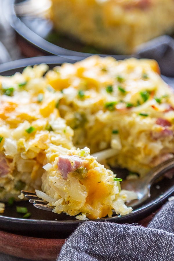 casserole with bite out it with a fork