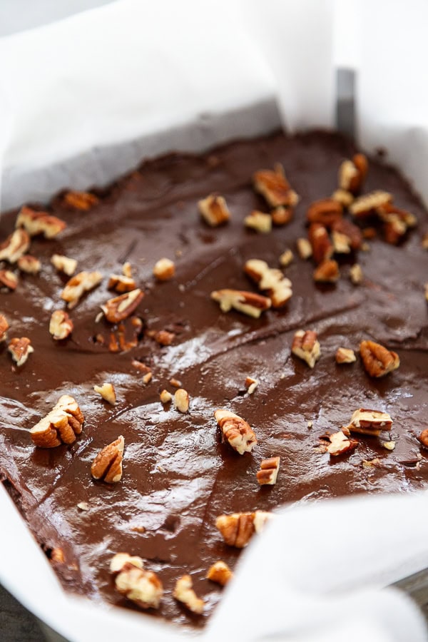 fudge in pan with pecans