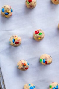 M&M Cookie dough on baking sheet