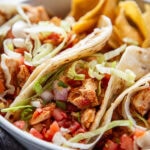plate of 4 chicken tacos