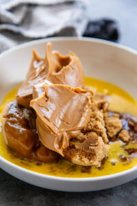 peanut butter, brown sugar, egg in a white bowl