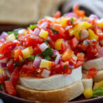close up shot of tomato pepper bruschetta