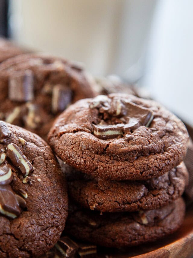 close up shot of chocolate andes mint cookies stacked