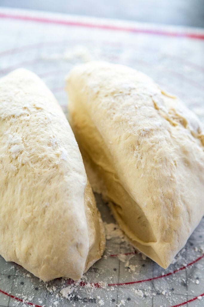 bread dough into two pieces