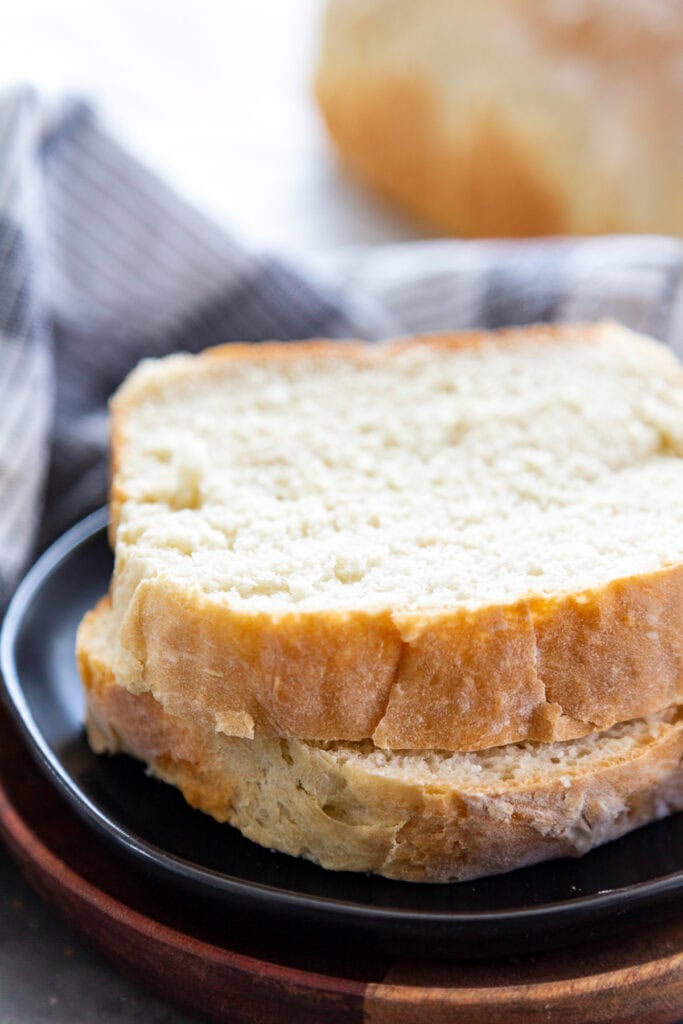 homemade white bread on plate sliced